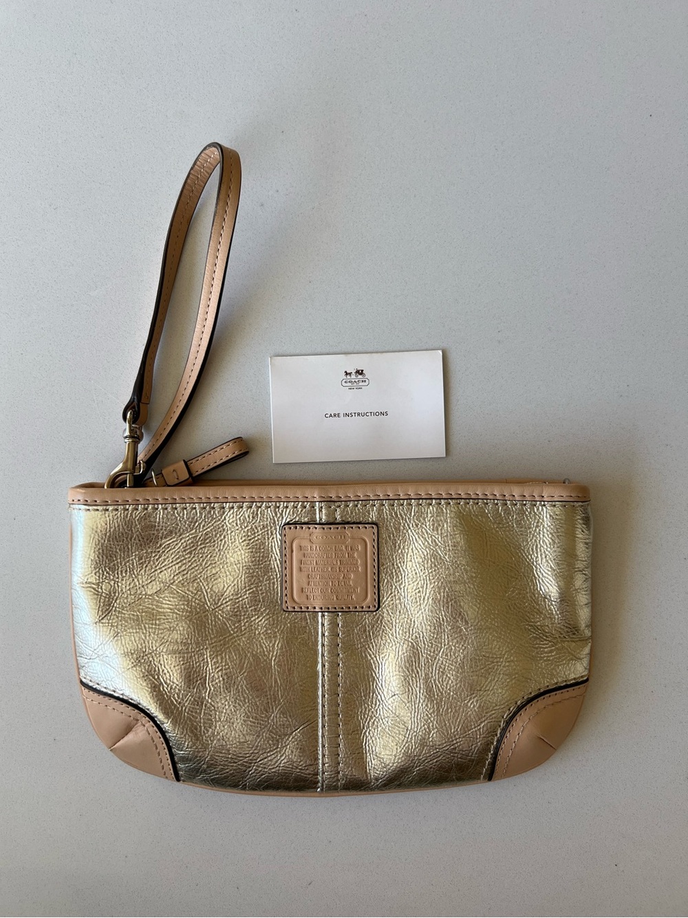 COACH Metallic Gold Wristlet Clutch